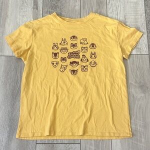 Junior’s Yellow Animal Crossing Graphic T-Shirt with Character Faces